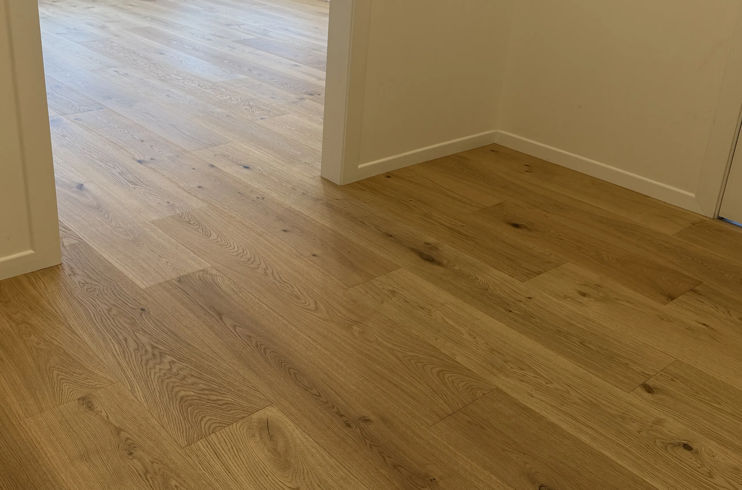 Sunlit ATS Timber engineered oak floor by a doorway