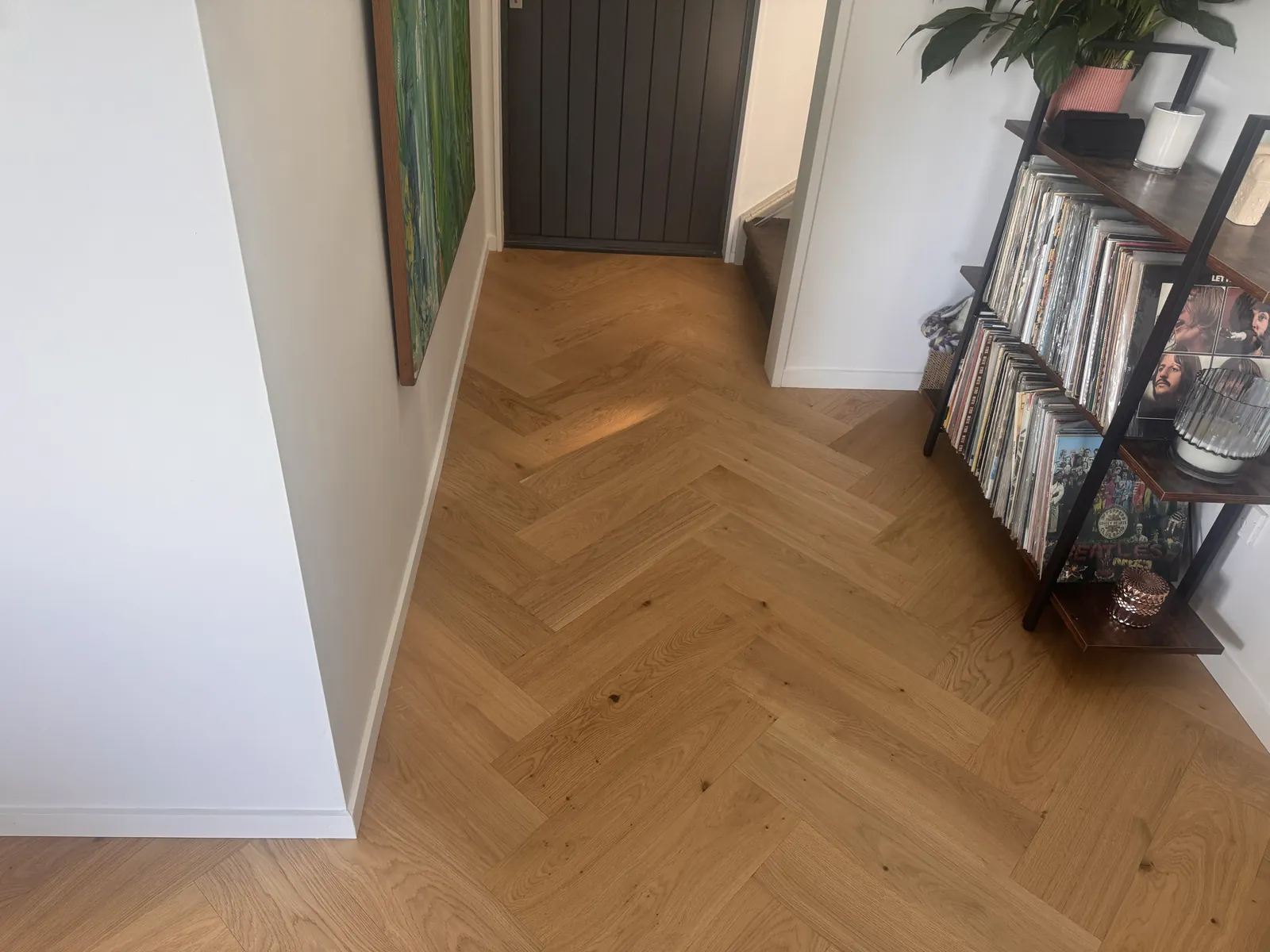 Natural Clear herringbone engineered timber through the entry hallway at Whangaparaoa Road, Red Beach