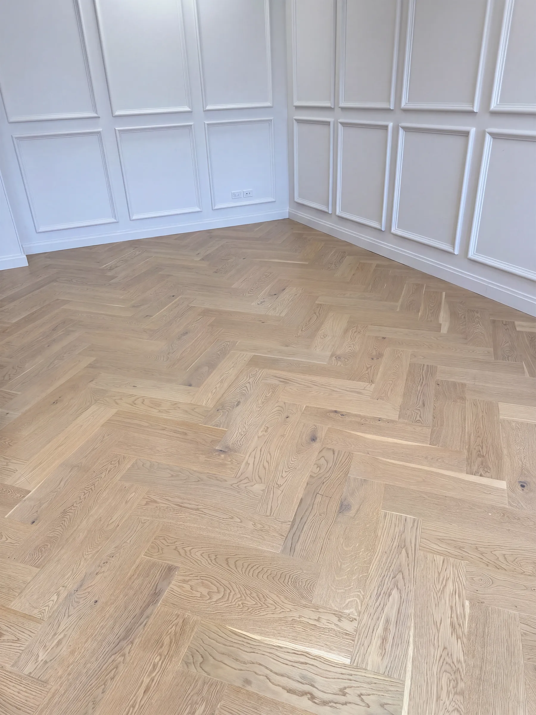 Western herringbone engineered timber on the floor of the old ATS Design showroom on Crummer Road, Grey Lynn