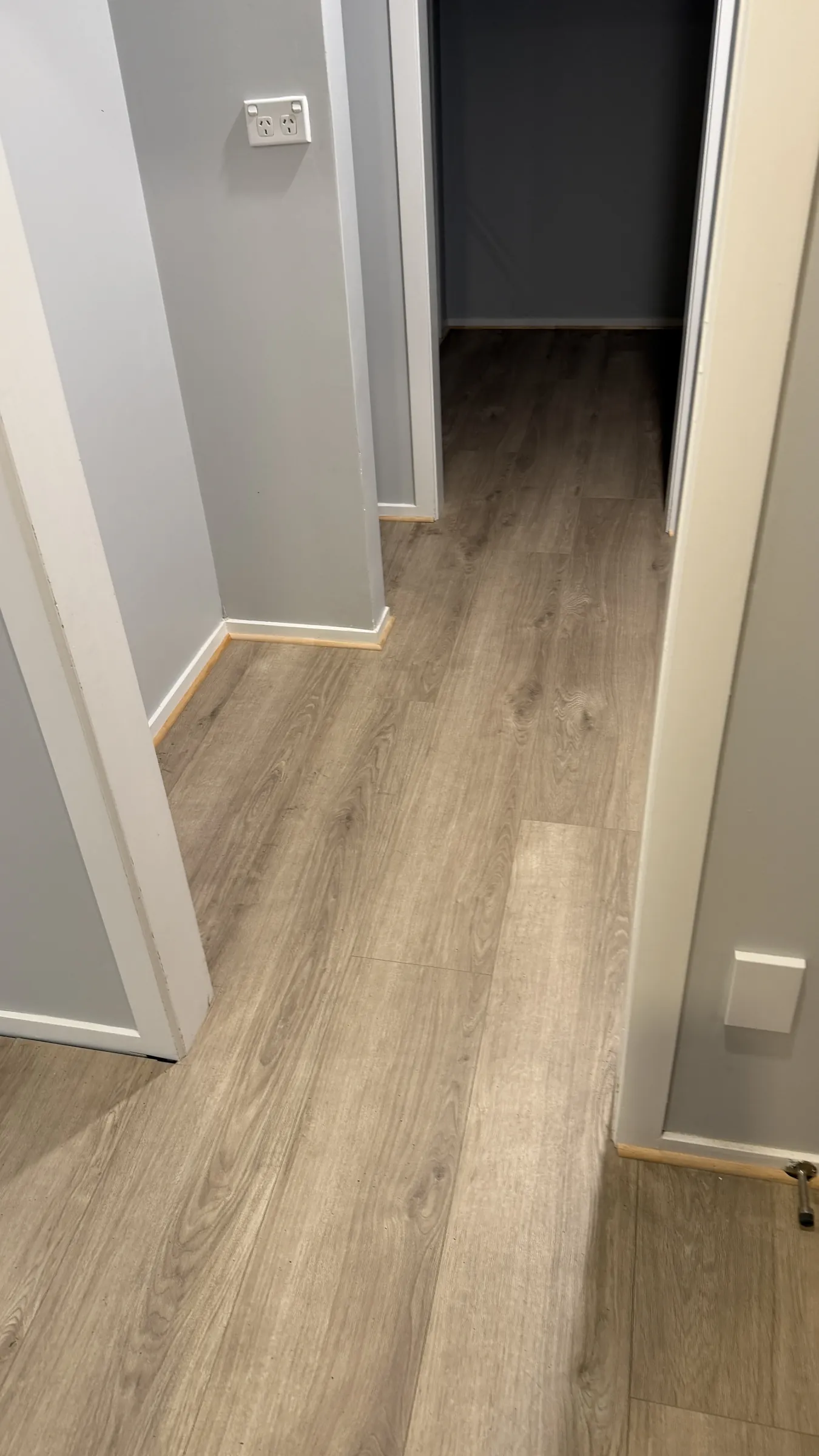 270-10 laminate flowing from the hallway into the bedrooms at Prictor Road, Wellsford