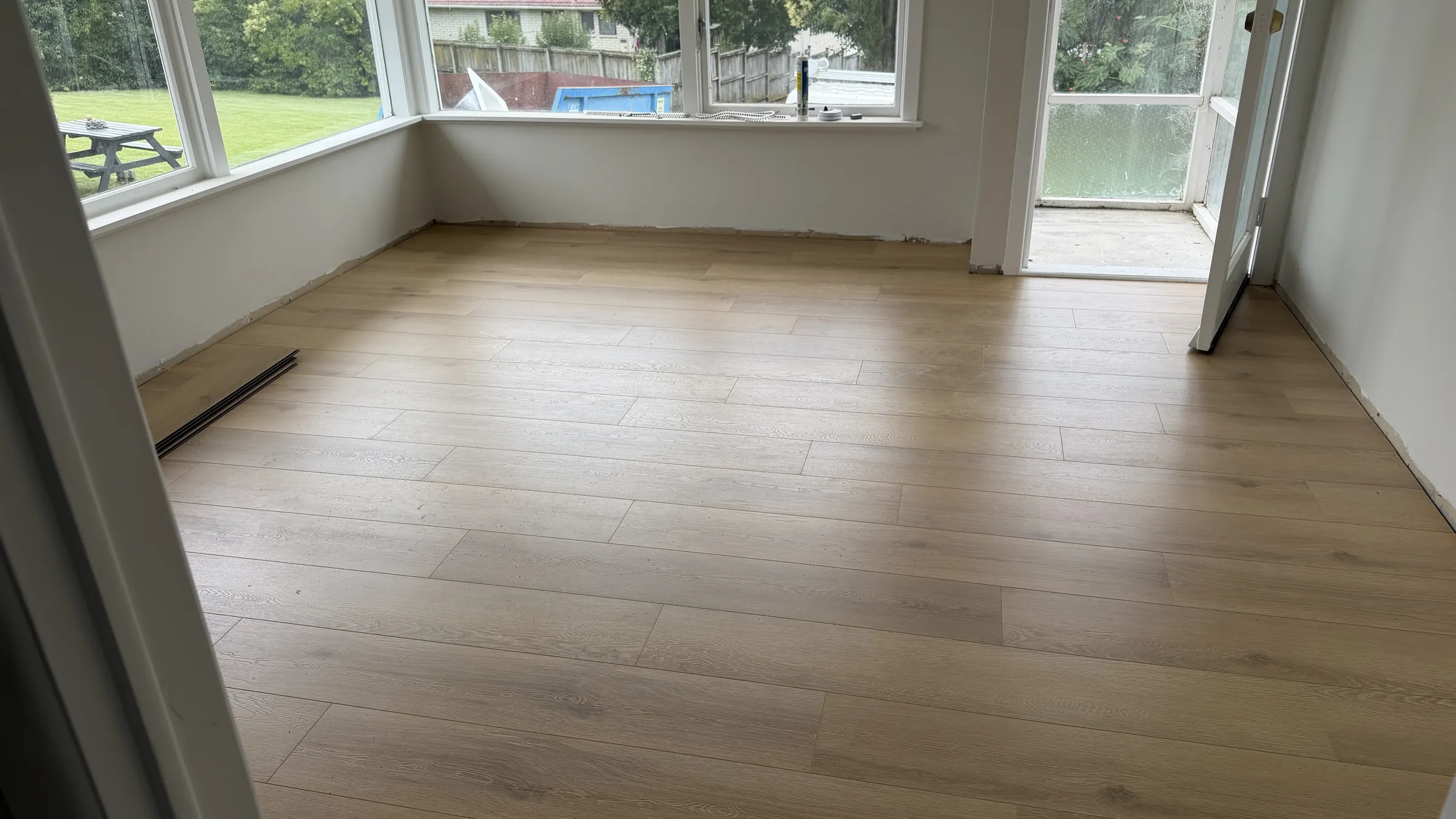 76039-26 laminate in the sunlit dining room at Te Atatū Road, Te Atatū South