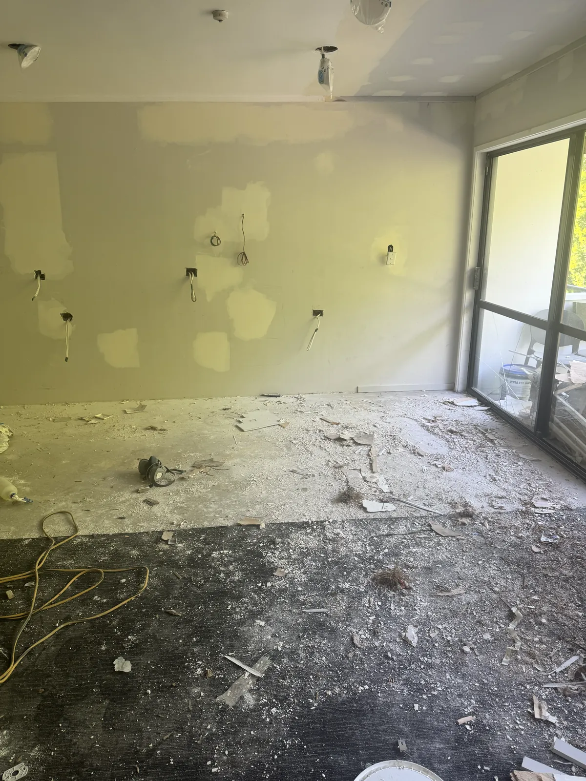 The Manukau Hotel breakfast room stripped out, debris across the old floor