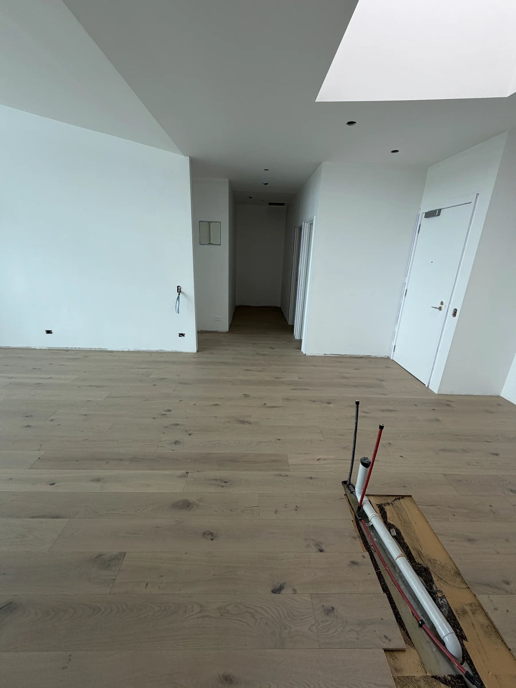 ATS Timber Latte Luxury 190mm flooring running between rooms at The Nautilus, Orewa