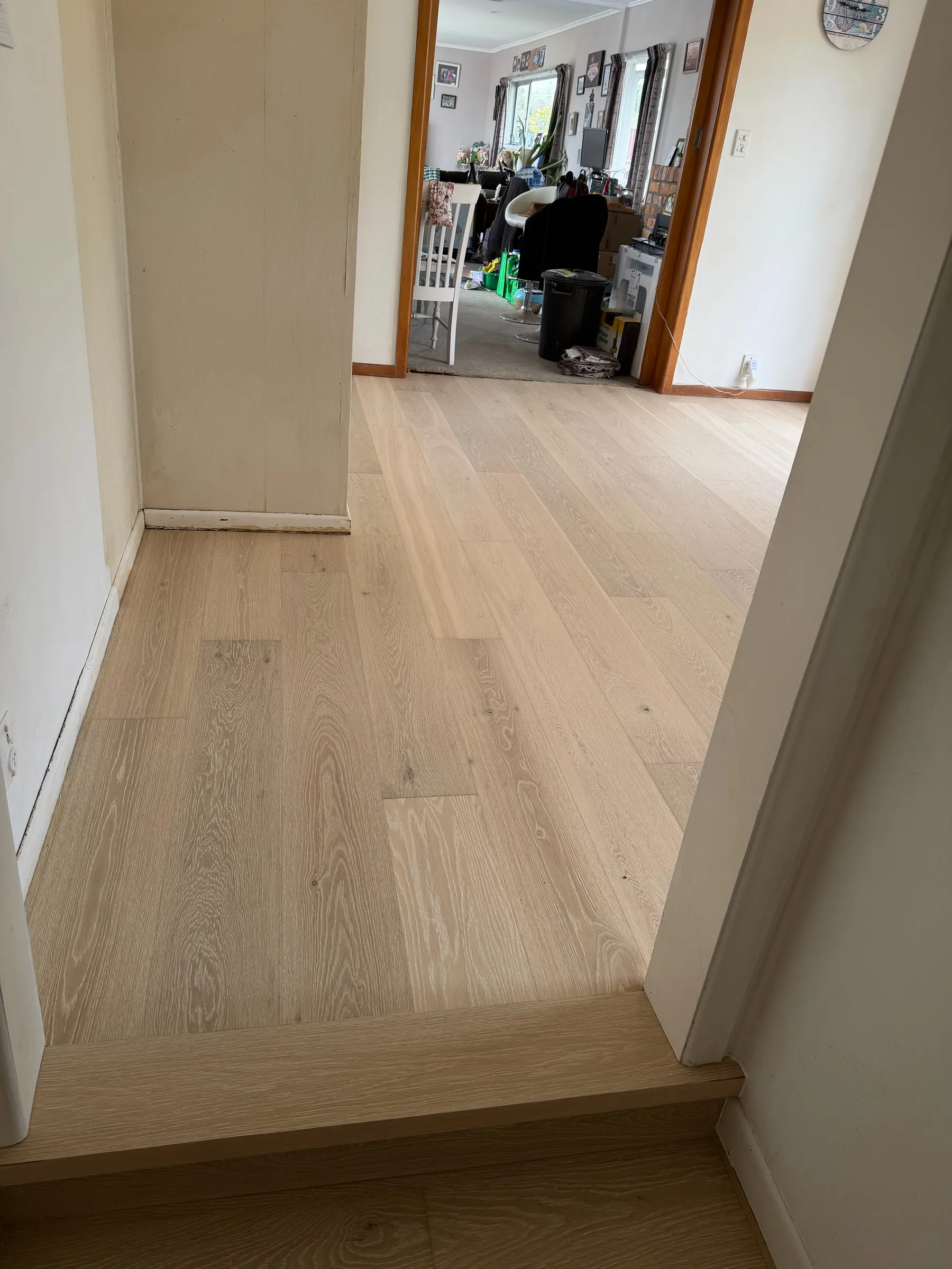 White Wash oak plank down the hallway and into the living room at Winifred Avenue, Bayview