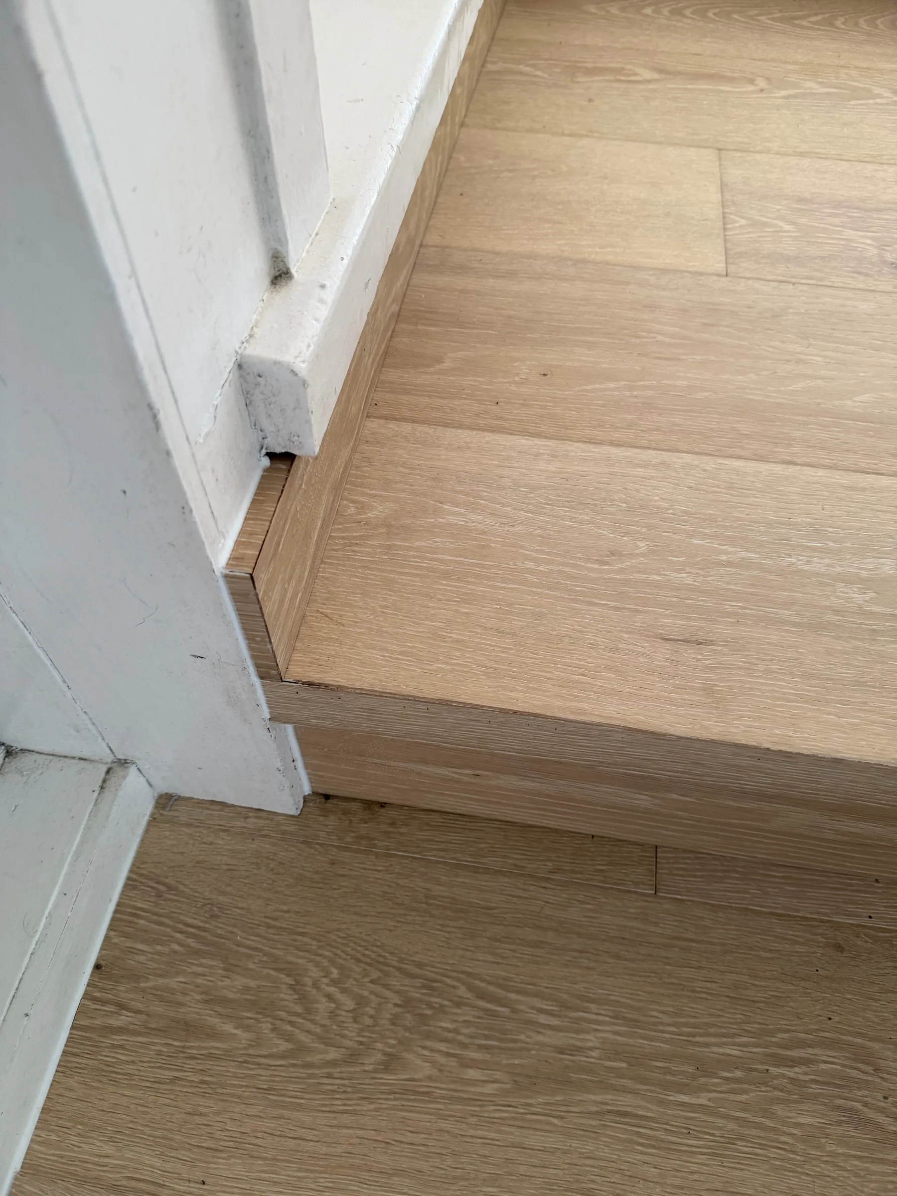 A close-up of White Wash oak plank step nosings at Winifred Avenue, Bayview