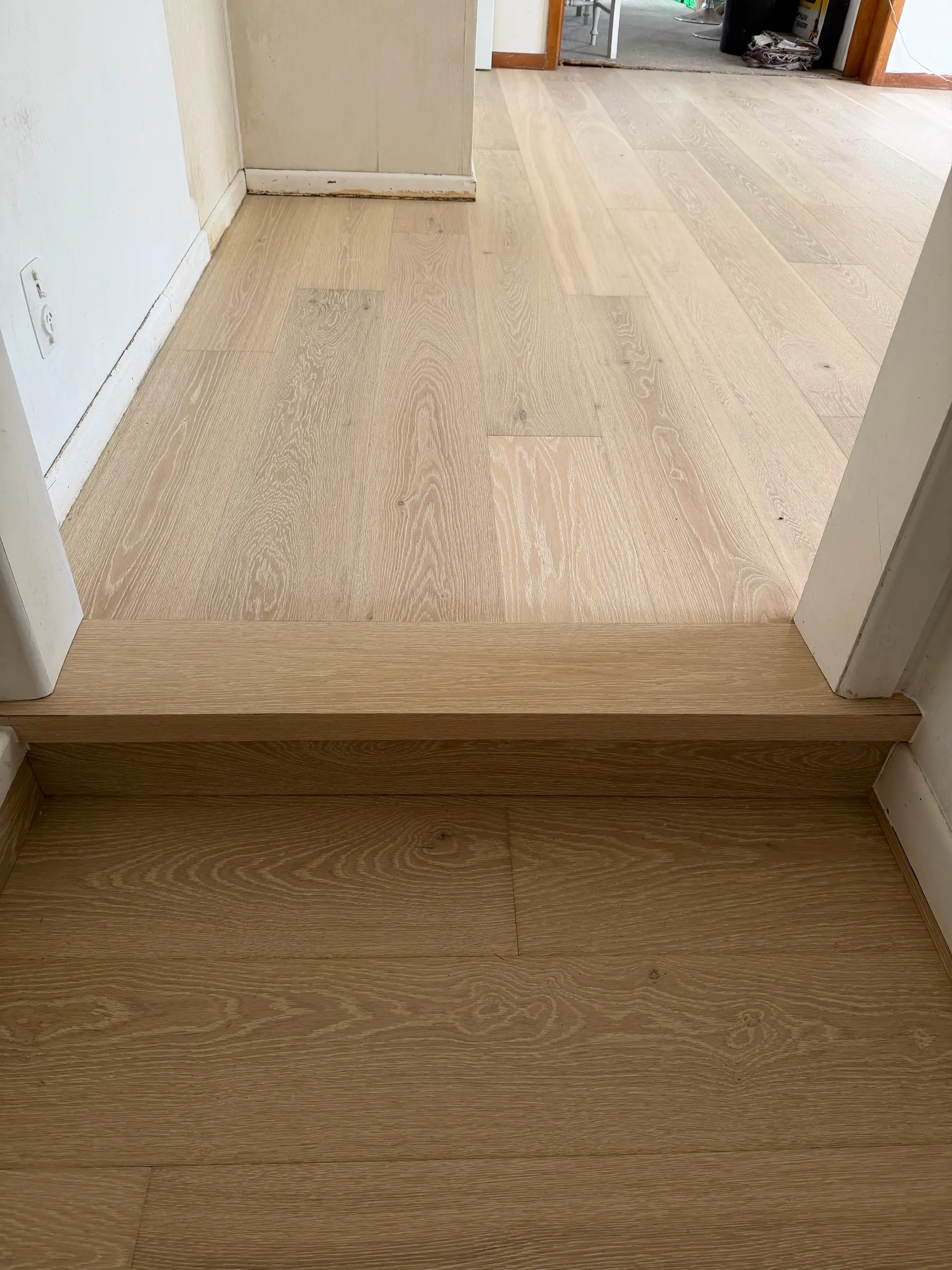 White Wash oak plank at a half-level step at Winifred Avenue, Bayview
