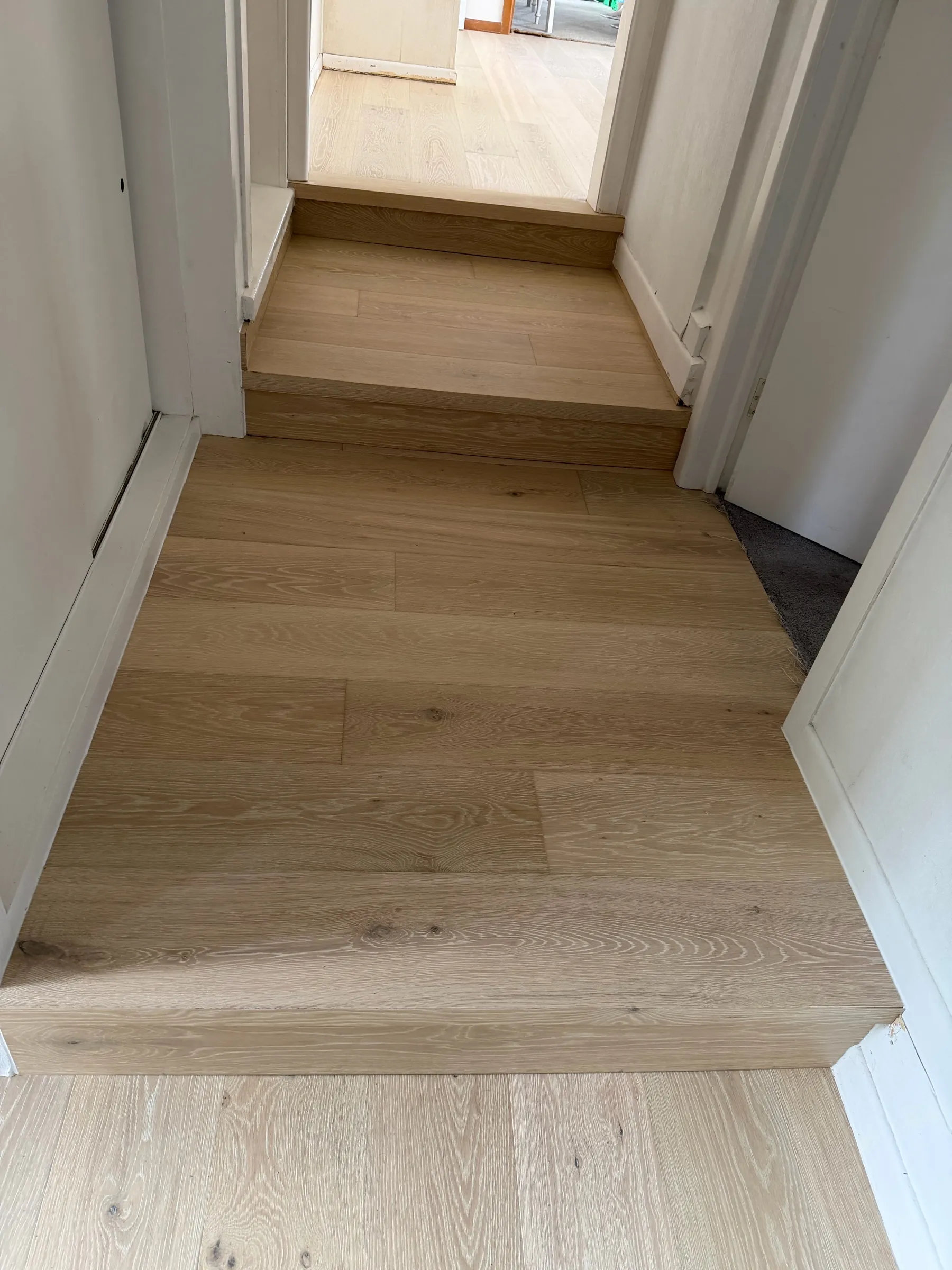 White Wash oak plank steps looking down the hallway at Winifred Avenue, Bayview