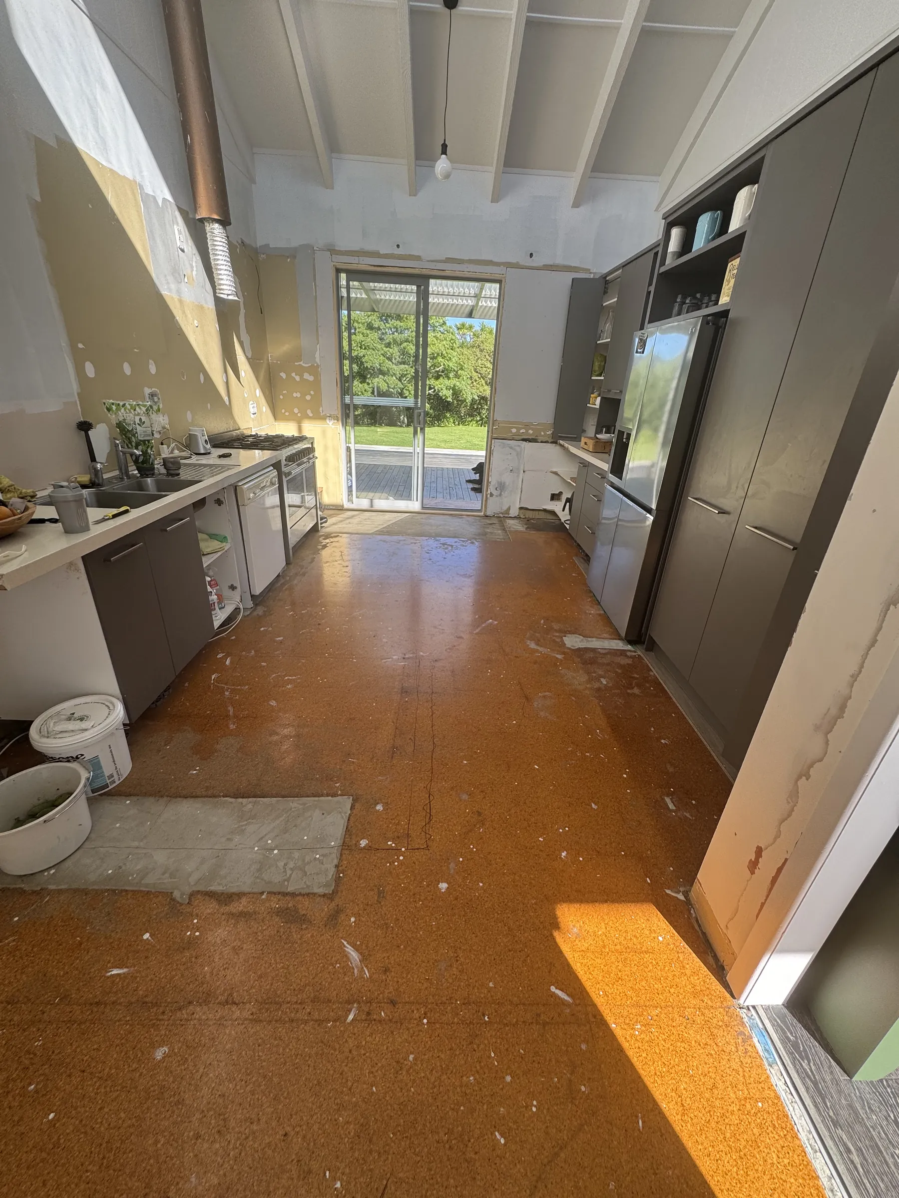 The kitchen at Shaw Road, Oratia mid renovation on our first visit, the old floor still down