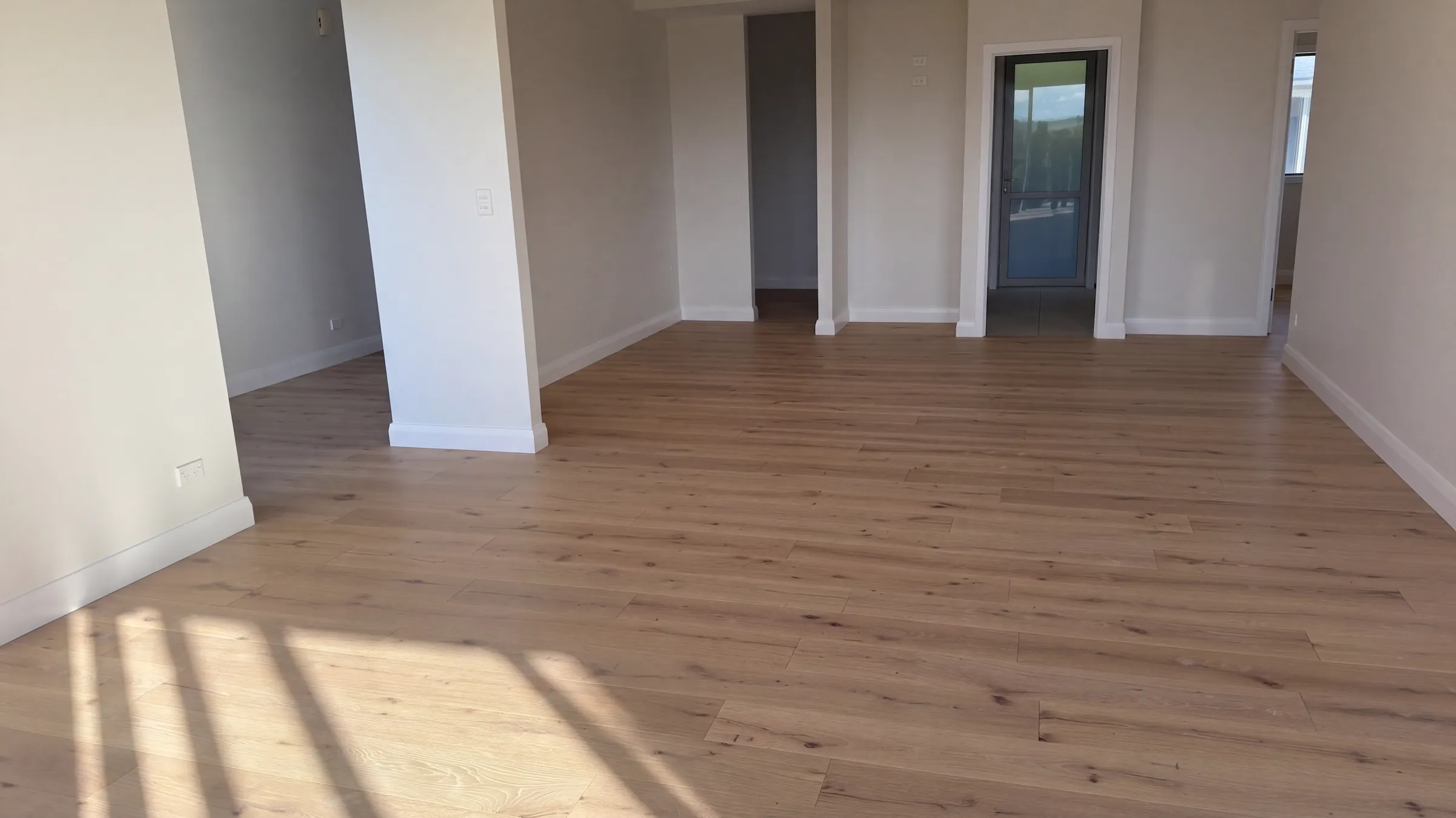 ATS Timber Light Oak 190mm flooring in a bright new living space at Spinnaker Drive, Te Atatu Peninsula