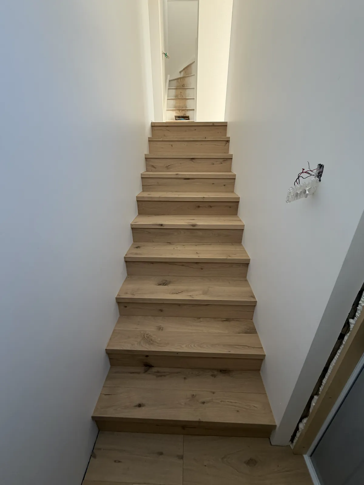 The new staircase in ATS Timber Light Oak at Victoria Road, Devonport